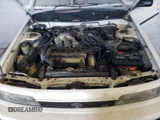 1991 Toyota Camry z VIN 4T1VV21E8MU050409, wystawiony jako Copart lot #61379824 z przebiegiem 100 949 mil mil oraz Nie do naprawy • Non repairable. Historia ofert i sprzedaży dostępna na DreamBid. Obrazek 11.