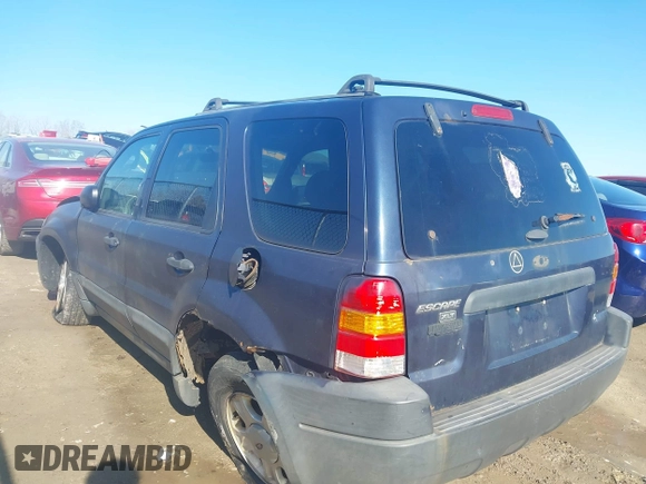 2003 Ford Escape XLT Popular with VIN 1FMYU03103KD07779, listed as a IAAI auction lot 42019919 with 245,522 mi miles. Bid and sale history available at carsss.com. Image 3.