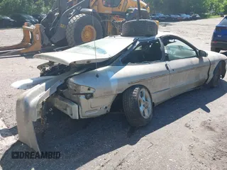 1994 Ford Probe с VIN 1ZVLT22B4R5184936, выставлен на аукционе IAAI как лот 42342496 с пробегом Не указан миль и . История ставок и продаж доступна на DreamBid. Изображение 4.