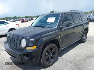 2009 Jeep Patriot Sport with VIN 1J4FT28BX9D140446, listed as a IAAI auction lot 40098694 with 202,342 mi miles and . Bid and sale history available at DreamBid. Image 14.
