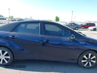 2016 Toyota Mirai with VIN JTDBVRBD6GA000989, listed as a IAAI auction lot 42098383 with 63,686 mi miles and . Bid and sale history available at DreamBid. Image 6.