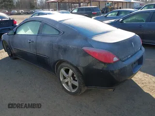 2006 Pontiac G6 GTP with VIN 1G2ZM171764170734, listed as a IAAI auction lot 41439398 with 149,479 mi miles. Bid and sale history available at carsss.com. Image 3.
