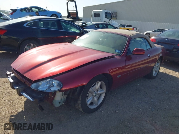 1997 Jaguar XK with VIN SAJGX2748VC011754, listed as a IAAI auction lot 41979459 with 34,601 mi miles and . Bid and sale history available at DreamBid. Image 2.
