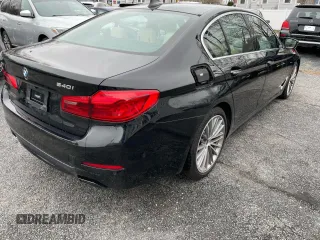 2017 BMW 5 Series 540i xDrive with VIN WBAJE7C36HG890783, listed as a Copart auction lot 55098475 with 128,332 mi miles and Clean title. Bid and sale history available at DreamBid. Image 4.