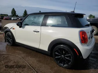 2016 MINI Hardtop with VIN WMWXP5C5XG2D15482, listed as a Copart auction lot 59652125 with 99,066 mi miles and Salvage title. Bid and sale history available at DreamBid. Image 2.
