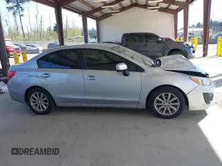 2013 Subaru Impreza Premium z VIN JF1GJAC63DH016174, wystawiony jako IAAI lot #42047371 z przebiegiem 172 377 mil mil oraz . Historia ofert i sprzedaży dostępna na DreamBid. Obrazek 13.