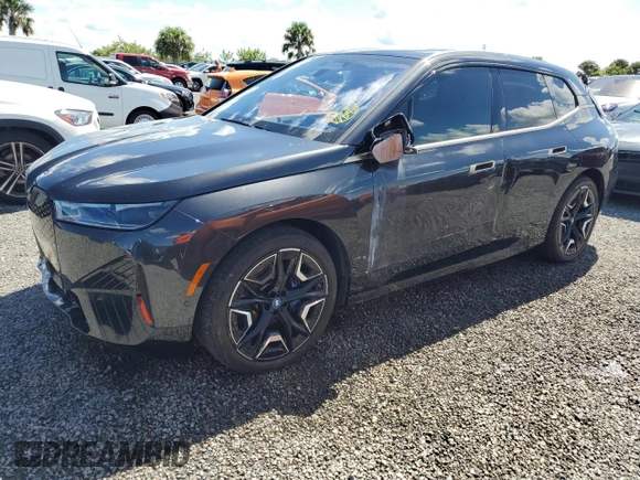 2024 BMW iX M60 z VIN WB533CF00RCN01751, wystawiony jako Copart lot #74145244 z przebiegiem 21 347 mil mil oraz Szkoda całkowita • Salvage title. Historia ofert i sprzedaży dostępna na DreamBid. Obrazek 1.