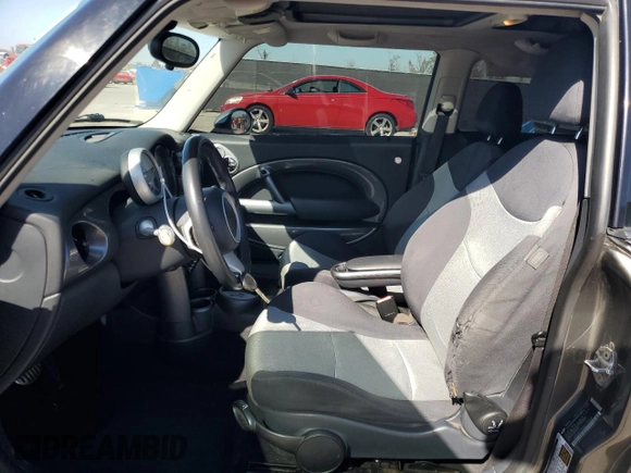 2006 MINI Hardtop S with VIN WMWRE33596TJ33149, listed as a Copart auction lot 43462805 with Not Provided miles and Salvage Title. Bid and sale history available at DreamBid. Image 7.