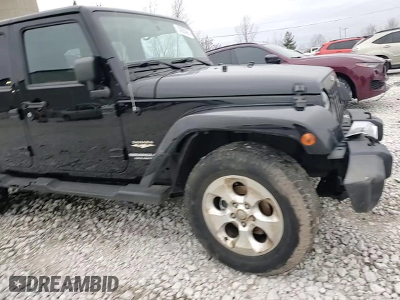 2015 Jeep Wrangler Unlimited Sahara with VIN 1C4BJWEGXFL606573, listed as a Copart auction lot 83983894 with 103,314 mi miles and Clean title. Bid and sale history available at DreamBid. Image 12.