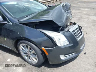 2013 Cadillac XTS Luxury z VIN 2G61P5S34D9109189, wystawiony jako IAAI lot #42242533 z przebiegiem 178 234 mil mil oraz . Historia ofert i sprzedaży dostępna na DreamBid. Obrazek 18.