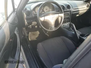 2002 Mazda MX-5 Miata Cloth with VIN JM1NB353420220801, listed as a Copart auction lot 61808645 with 116,451 mi miles and Salvage title. Bid and sale history available at DreamBid. Image 8.