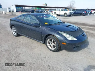 2000 Toyota Celica GT with VIN JTDDR32T1Y0053060, listed as a IAAI auction lot 41572670 with 258,437 mi miles. Bid and sale history available at carsss.com. Image 1.