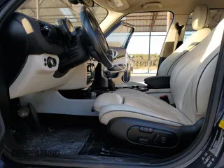 2017 MINI Clubman Cooper S with VIN WMWLU5C56H2E82110, listed as a Copart auction lot 79826004 with 82,756 mi miles and Clean Title. Bid and sale history available at carsss.com. Image 7.