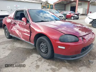 1995 Honda del Sol S with VIN JHMEG1144SS003580, listed as a IAAI auction lot 41701598 with 276,749 mi miles. Bid and sale history available at carsss.com. Image 1.