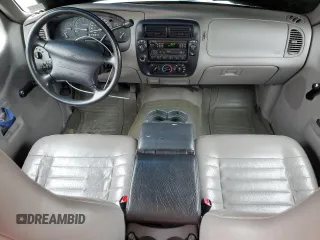 1999 Ford Explorer XL z VIN 1FMZU34X6XUC27678, wystawiony jako Copart lot #57073105 z przebiegiem 228 525 mil mil oraz Czysty tytuł • Clean title. Historia ofert i sprzedaży dostępna na DreamBid. Obrazek 8.