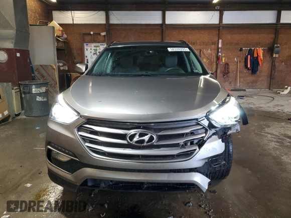 2017 Hyundai Santa Fe 2.4L z VIN 5XYZUDLBXHG415400, wystawiony jako Copart lot #58330205 z przebiegiem 116 196 mil mil oraz Szkoda całkowita • Salvage title. Historia ofert i sprzedaży dostępna na DreamBid. Obrazek 5.