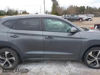 2016 Hyundai Tucson Sport with VIN KM8J33A21GU254828, listed as a IAAI auction lot 41297692 with 134,394 mi miles. Bid and sale history available at carsss.com. Image 13.