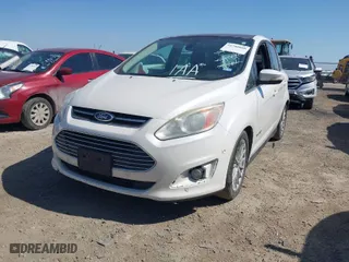 2015 Ford C-Max Hybrid SEL with VIN 1FADP5BU8FL104632, listed as a IAAI auction lot 41780808 with 196,673 mi miles. Bid and sale history available at carsss.com. Image 2.
