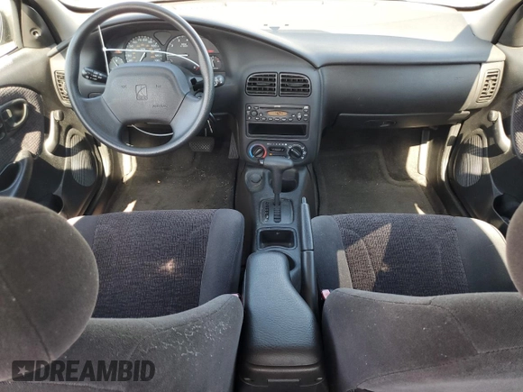 2000 Saturn SL z VIN 1G8ZK5279YZ252761, wystawiony jako Copart lot #63204475 z przebiegiem 80 646 mil mil oraz Czysty tytuł • Clean title. Historia ofert i sprzedaży dostępna na DreamBid. Obrazek 8.
