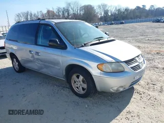 2005 Dodge Caravan SXT with VIN 2D4GP44L45R477780, listed as a IAAI auction lot 41654075 with 166,060 mi miles. Bid and sale history available at carsss.com. Image 1.