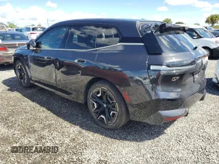 2024 BMW iX M60 z VIN WB533CF00RCN01751, wystawiony jako Copart lot #74145244 z przebiegiem 21 347 mil mil oraz Szkoda całkowita • Salvage title. Historia ofert i sprzedaży dostępna na DreamBid. Obrazek 2.