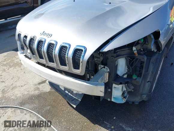 2015 Jeep Cherokee Latitude with VIN 1C4PJLCB8FW620336, listed as a IAAI auction lot 41634997 with 130,335 mi miles. Bid and sale history available at carsss.com. Image 18.