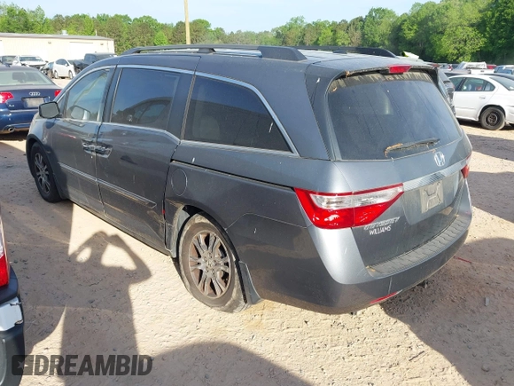 2012 Honda Odyssey EX-L with VIN 5FNRL5H63CB006272, listed as a IAAI auction lot 42074163 with 187,785 mi miles and . Bid and sale history available at carsss.com. Image 3.