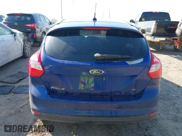 2012 Ford Focus SE z VIN 1FAHP3K28CL297610, wystawiony jako IAAI lot #41999068 z przebiegiem 164 482 mil mil oraz . Historia ofert i sprzedaży dostępna na DreamBid. Obrazek 16.