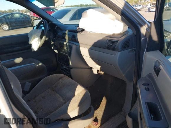 2005 Ford Freestar S z VIN 2FMZA50615BA37923, wystawiony jako IAAI lot #40896205 z przebiegiem 229 168 mil mil oraz . Historia ofert i sprzedaży dostępna na DreamBid. Obrazek 5.