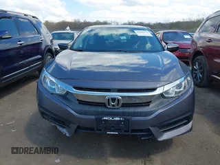 2018 Honda Civic LX with VIN 2HGFC2F5XJH586527, listed as a IAAI auction lot 42080372 with 52,114 mi miles and . Bid and sale history available at DreamBid. Image 13.