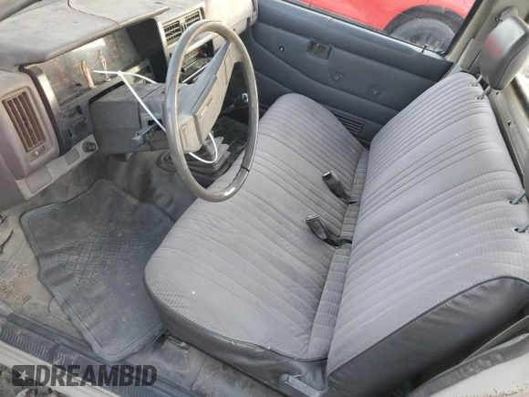 1986 Nissan Hardbody E z VIN JN6ND11S1GW037479, wystawiony jako Copart lot #81775934 z przebiegiem 389 841 mil mil oraz Szkoda całkowita • Salvage title. Historia ofert i sprzedaży dostępna na DreamBid. Obrazek 7.
