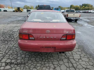 1995 Toyota Camry LE with VIN JT2GK12E6S0102213, listed as a Copart auction lot 77935474 with 166,844 mi miles and Clean Title. Bid and sale history available at carsss.com. Image 6.