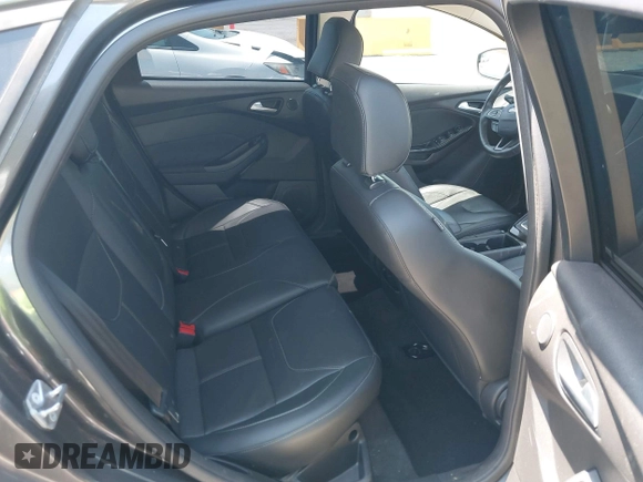 2018 Ford Focus Titanium with VIN 1FADP3N28JL232120, listed as a IAAI auction lot 42544070 with 28,661 mi miles and . Bid and sale history available at DreamBid. Image 8.