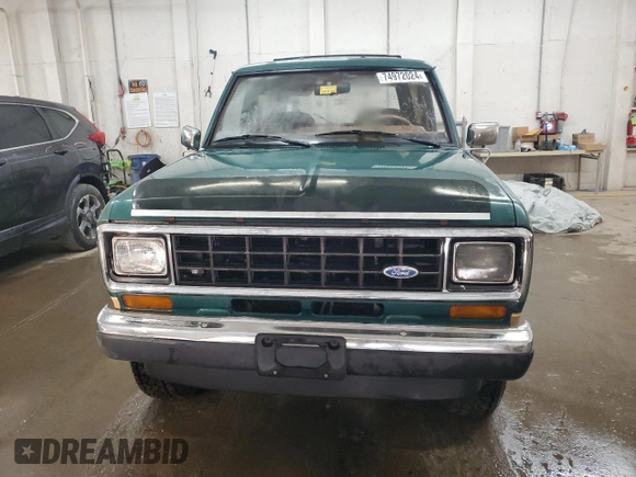 1987 Ford Bronco z VIN 1FMCU14T8HUA51662, wystawiony jako Copart lot #74972024 z przebiegiem 26 362 mil mil oraz Szkoda całkowita • Salvage title. Historia ofert i sprzedaży dostępna na DreamBid. Obrazek 5.