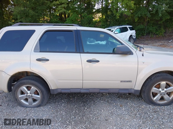 2008 Ford Escape XLT with VIN 1FMCU93198KE17879, listed as a IAAI auction lot 40125825 with 214,373 mi miles and . Bid and sale history available at DreamBid. Image 14.