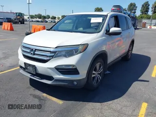 2016 Honda Pilot EX-L with VIN 5FNYF5H54GB037742, listed as a IAAI auction lot 41988112 with 68,459 mi miles and . Bid and sale history available at DreamBid. Image 17.