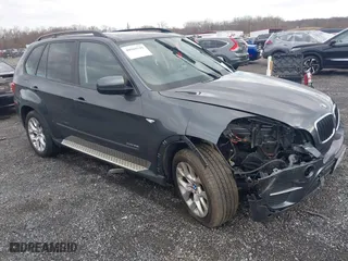 2011 BMW X5 35i with VIN 5UXZV4C59BL415034, listed as a IAAI auction lot 40969149 with 108,468 mi miles. Bid and sale history available at carsss.com. Image 1.
