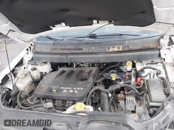 2013 Dodge Journey SE with VIN 3C4PDCAB7DT695493, listed as a IAAI auction lot 42450756 with 153,064 mi miles and . Bid and sale history available at DreamBid. Image 10.
