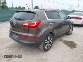 2011 Kia Sportage EX with VIN KNDPC3A23B7029574, listed as a IAAI auction lot 42168504 with 208,407 mi miles. Bid and sale history available at carsss.com. Image 4.