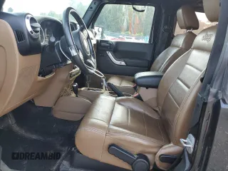 2011 Jeep Wrangler Sahara with VIN 1J4AA5D15BL552185, listed as a Copart auction lot 63065185 with 159,850 mi miles and Salvage title. Bid and sale history available at DreamBid. Image 7.