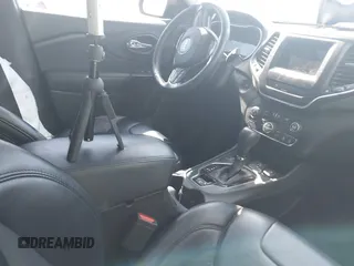 2019 Jeep Cherokee Latitude Plus with VIN 1C4PJMLX8KD432780, listed as a IAAI auction lot 42384043 with 98,099 mi miles and . Bid and sale history available at DreamBid. Image 5.