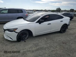 2017 Mazda 6 Grand Touring with VIN JM1GL1W51H1130289, listed as a Copart auction lot 52769205 with 82,155 mi miles and Salvage Title. Bid and sale history available at carsss.com. Image 1.