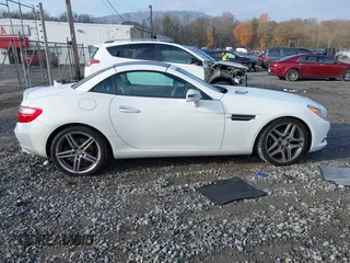 2014 Mercedes-Benz SLK 250 with VIN WDDPK4HA2EF085432, listed as a IAAI auction lot 41141812 with 65,718 mi miles and . Bid and sale history available at DreamBid. Image 13.