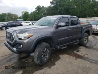 2018 Toyota Tacoma SR with VIN 5TFCZ5AN1JX147799, listed as a Copart auction lot 54337455 with 189,899 mi miles and Salvage Title. Bid and sale history available at DreamBid. Image 1.