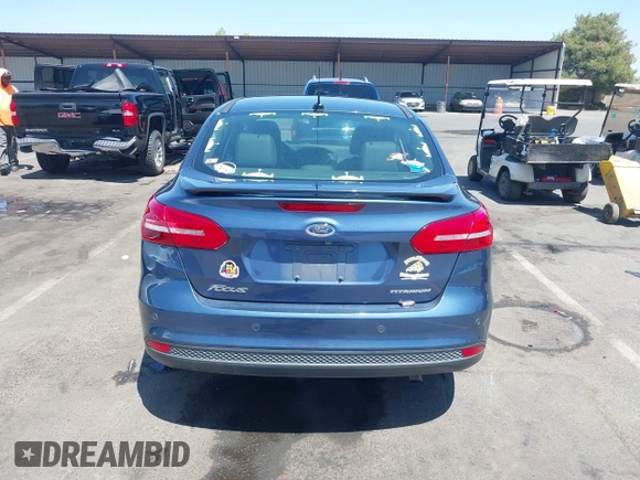 2018 Ford Focus Titanium with VIN 1FADP3J21JL323767, listed as a IAAI auction lot 42375218 with 104,440 mi miles and . Bid and sale history available at DreamBid. Image 16.