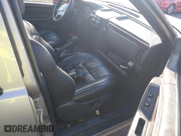 2001 Jeep Grand Cherokee Limited with VIN 1J4GW58N11C650606, listed as a IAAI auction lot 41722256 with 1 mi miles. Bid and sale history available at carsss.com. Image 5.