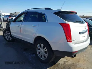 2015 Cadillac SRX with VIN 3GYFNAE34FS557297, listed as a IAAI auction lot 41388573 with 124,185 mi miles and . Bid and sale history available at DreamBid. Image 3.