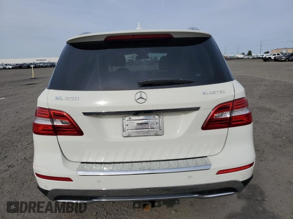 2013 Mercedes-Benz M 350 with VIN 4JGDA2EB2DA221051, listed as a Copart auction lot 52805955 with 136,797 mi miles and Salvage title. Bid and sale history available at DreamBid. Image 6.