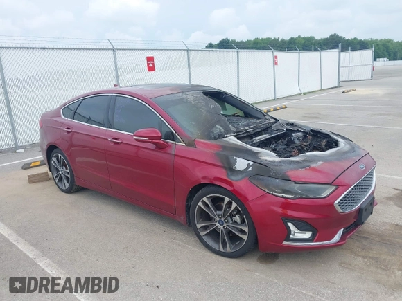 2019 Ford Fusion Titanium с VIN 3FA6P0D96KR152789, выставлен на аукционе IAAI как лот 42523192 с пробегом Не указан миль и . История ставок и продаж доступна на DreamBid. Изображение 1.