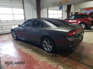 2014 Dodge Charger SXT with VIN 2C3CDXJG2EH211164, listed as a Copart auction lot 68972554 with 125,539 mi miles and Salvage Title. Bid and sale history available at carsss.com. Image 2.